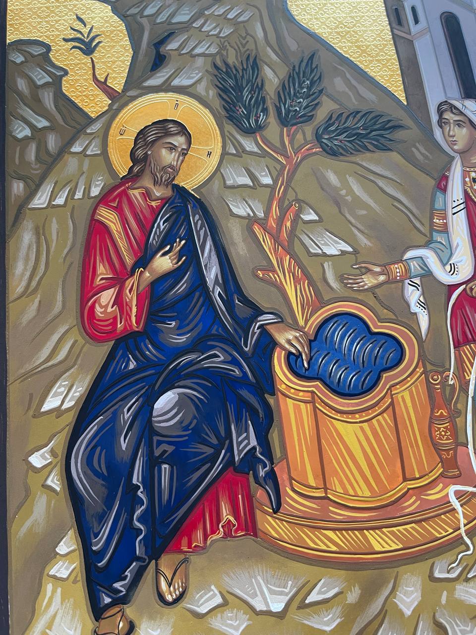Jesús hablando con la mujer samaritana.