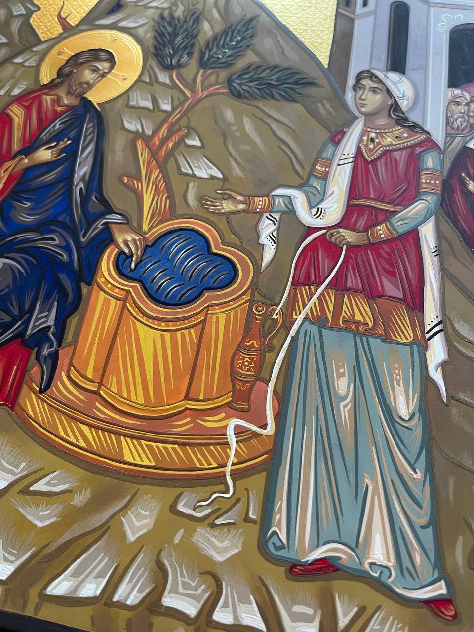 Jesús hablando con la mujer samaritana.